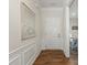 Entryway with decorative molding and a white front door leading to the rest of the home at 1026 Kirby Dr, Fort Mill, SC 29715