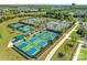 Aerial view of well-maintained pickleball courts in a community setting, perfect for active residents at 1026 Kirby Dr, Fort Mill, SC 29715