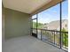 Enclosed porch that boasts an exceptional view of the outdoors with a chair at 1026 Kirby Dr, Fort Mill, SC 29715