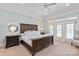 Comfortable bedroom retreat with a large bed, soft carpet, lots of natural light, and a tranquil atmosphere at 1304 Lookout Cir, Waxhaw, NC 28173