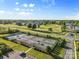 Aerial view of community tennis courts and well-kept landscaping at 1308 Stone Marker Dr, Monroe, NC 28112