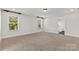 Spacious bedroom featuring neutral carpet, dual windows, and painted trim at 1308 Stone Marker Dr, Monroe, NC 28112