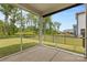 Enjoyable screened-in porch offers relaxing views of the backyard and surrounding greenery at 1308 Stone Marker Dr, Monroe, NC 28112