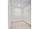 Walk-in closet with neutral walls and carpet and wire shelving for storage at 1308 Stone Marker Dr, Monroe, NC 28112