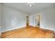Simple bedroom features hardwood floors and two closets near a connecting bathroom at 146 Walnut St, Chester, SC 29706