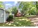 Backyard view featuring a small deck at 16320 Peach Grove Ln, Charlotte, NC 28277