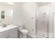 Clean bathroom features glass shower, modern vanity, and mosaic tile flooring at 16320 Peach Grove Ln, Charlotte, NC 28277