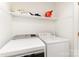 Laundry area with white appliances at 16320 Peach Grove Ln, Charlotte, NC 28277