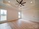 Bedroom features hardwood floors, natural light, and a neutral color palette at 1706 Ruben Rd, Monroe, NC 28112