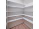 Spacious pantry features custom shelving for optimal organization and storage at 1706 Ruben Rd, Monroe, NC 28112