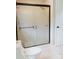 Bathroom featuring a shower with frosted glass doors and modern fixtures at 18 Shannon Ct, Newton, NC 28658