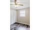 Bedroom featuring hardwood floors, white walls, white closet doors, and a window with blinds at 18 Shannon Ct, Newton, NC 28658