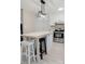 Well-lit kitchen with an island, modern appliances, and sleek countertops at 18 Shannon Ct, Newton, NC 28658