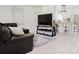 Open-concept living room connected to the kitchen, featuring stylish decor and a cozy seating area at 18 Shannon Ct, Newton, NC 28658
