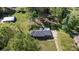 Aerial view of a quaint home, surrounded by a lush landscape at 205 Timberfield Trl, China Grove, NC 28023