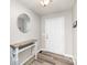 Entryway with light gray walls, mirror, and decorative table, offering a welcoming entrance at 205 Timberfield Trl, China Grove, NC 28023