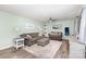 Inviting living room with a large sectional sofa, TV, and stylish decor at 205 Timberfield Trl, China Grove, NC 28023