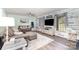 Inviting living room with a large sectional sofa, TV, and stylish decor at 205 Timberfield Trl, China Grove, NC 28023