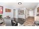 Office space with hard surface floors, modern light fixture and a small bar area for entertaining at 205 Timberfield Trl, China Grove, NC 28023