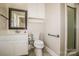 Clean bathroom with updated fixtures, including a vanity, toilet, and stand-up shower at 209 Woodstream Cir, Mooresville, NC 28117