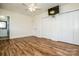 Bright bedroom with large closet and ceiling fan adjacent to a bathroom at 209 Woodstream Cir, Mooresville, NC 28117