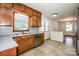 Functional kitchen with stainless steel appliances, lots of cabinets, and great natural light at 209 Woodstream Cir, Mooresville, NC 28117