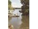 Waterfront view on Lake Wylie featuring a private dock and calm waters, perfect for boating and recreation at 209 Woodstream Cir, Mooresville, NC 28117