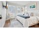 Bright bedroom featuring modern decor, plush bedding, and ample natural light at 2111 Isom St, Charlotte, NC 28208