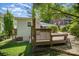 View of back deck showing basement access, railing and garden at 2125 Chatham Ave, Charlotte, NC 28205