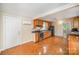 Modern kitchen with wood cabinets, stainless steel appliances, and neutral countertops at 2125 Chatham Ave, Charlotte, NC 28205