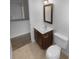 Cozy bathroom featuring a vanity, toilet, and updated finishes at 2140 Majestic Poplar Dr, Waxhaw, NC 28173