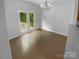 Dining area illuminated by a chandelier with access to the outdoor patio at 2140 Majestic Poplar Dr, Waxhaw, NC 28173