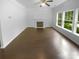 Inviting living room features a fireplace and large windows, offering natural light at 2140 Majestic Poplar Dr, Waxhaw, NC 28173