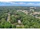 Expansive aerial view showcasing neighborhood and serene surroundings at 2202 Bearskin Ln, Monroe, NC 28110