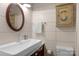 Modern bathroom featuring a stylish sink, toilet, and cabinet with wood accents at 2202 Bearskin Ln, Monroe, NC 28110