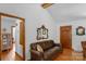 Inviting living room with vaulted ceilings, wood accents, and hardwood floors at 2202 Bearskin Ln, Monroe, NC 28110