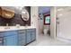 Charming bathroom featuring a double vanity, black accent wall, and a modern glass shower at 2329 Wedgewood Dr, Matthews, NC 28104