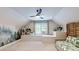 Bright bonus room featuring a leafy mural, daybed, and ample natural light from a window at 2329 Wedgewood Dr, Matthews, NC 28104