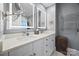 Modern bathroom with double sinks, LED mirrors, and a heated towel rack at 2311 Club Rd, Charlotte, NC 28205
