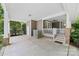 Covered carport with a concrete floor offering shelter and access to the backyard and home at 2311 Club Rd, Charlotte, NC 28205
