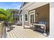 Outdoor deck features a grill, seating, and easy access to the home's interior at 2311 Club Rd, Charlotte, NC 28205