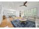 Spacious living room flowing into the dining area, featuring hardwood floors and ample natural light at 2311 Club Rd, Charlotte, NC 28205