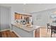 Kitchen island with granite countertop and stainless steel appliances at 233 E Waterlynn Rd # B, Mooresville, NC 28117
