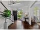 Elegant foyer with dark wood floors, an open doorway, and plenty of natural light at 2556 Howerton Ct, Charlotte, NC 28270