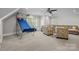 Large game room featuring a basketball game and large sectional sofa at 2556 Howerton Ct, Charlotte, NC 28270