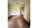 Bright bedroom with hardwood floors, ceiling fan, and neutral paint at 3063 Liledoun Rd, Taylorsville, NC 28681
