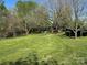 Charming single-Gathering home with large grassy yard and covered shed at 3063 Liledoun Rd, Taylorsville, NC 28681