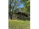 Single story home with a covered wooden deck at 3063 Liledoun Rd, Taylorsville, NC 28681