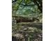 Quaint single story home with brick accents and covered wooden deck at 3063 Liledoun Rd, Taylorsville, NC 28681