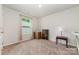 Clean and bright bedroom with plush carpet, a window, and neutral walls at 3138 Maple Ridge Dr, Gastonia, NC 28052